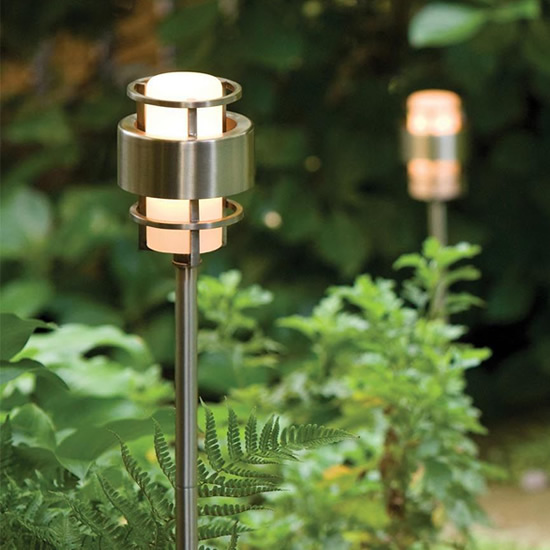 Hinkley's Saturn is a stunning, modern outdoor collection with robust construction and intersecting lines that create a striking contrast against the etched opal glass. Available in Stainless Steel or Solid Brass with Metro Bronze finish. The diffuser is Etched Opal glass.